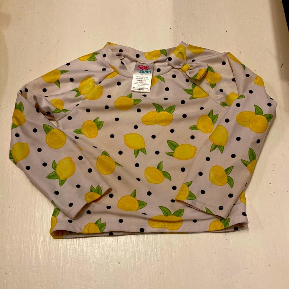 Lemon rash guard, size 4